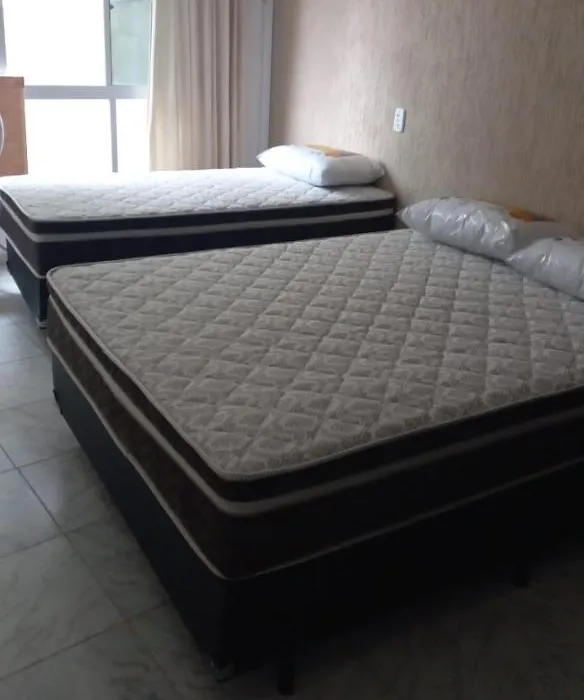 Apartamento com 4 quatros em frente a praia em Pitangueiras - Guarujá-1